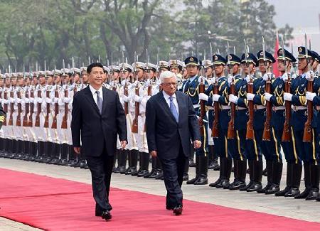 习近平同巴勒斯坦总统阿巴斯举行会谈时强调中方坚定支持巴勒斯坦人民的正义事业